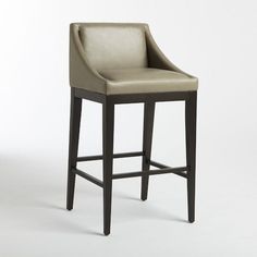 an upholstered bar stool with a leather seat and backrest, viewed from the front