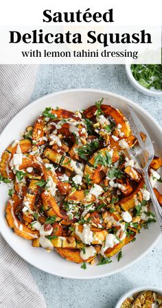 a white plate topped with grilled delicata squash and feta cheese sauce