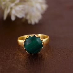 Malachite Gemstone Ring, Statement Ring, 18k gold plated Ring, handmade Ring, silver plated Ring, Boho Ring, Mother Gift, Dainty ring  Enjoy Free Shipping on All Orders *Handmade item *Dispatches from a small business in India *Materials         :-   Brass, 925 sterling Silver *Band colour    :-   Gold, Silver *Style                 :-   Boho & hippie *Can be personalized Product Description:-  PRODUCT CODE     :-  SIZE           :-    All Size Are Available. Choose From Variation. METAL           :-    Brass, 925 sterling silver STONE                    :-    malachite  STONE SHAPE        :-    Round Ring can be customized on request and gemstone can be made to any gemstone you want. If You Need Faster Shipping, Please Contact us Please Make Sure to Include The Correct Address During Befo Gold Rings With Natural Stones For Gift, Emerald Ring With Natural Stones For Gift, Gift Emerald Ring With Natural Stones, Gold-plated Birthstone Ring, Gold Plated Birthstone Ring, Gold Sterling Silver Rings With Natural Stones, Spiritual Gold Emerald Ring With Gemstone, Gold Emerald Ring With Spiritual Style, Natural Stone Rings For May Birthstone