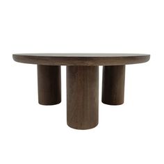 a round wooden table with three legs