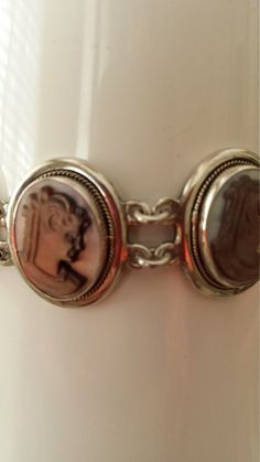 "Sterling silver vintage cameo 4 piece set. Ring size 6 1/8. The size of cameo including the sterling frame is 7/8\" long and 5/8\" wide. The cameo on bracelet are same size as ring. The cameos on the screw on earrings are a little smaller. The pendant is 1 3/8\" long and 1 \" wide. Around all the cameos is a gold rope decorative contrast over the sterling inner edge. The cameo is cut out of shell. The sterling is marked 800 which is a beautiful high end Italian set. The total weight of all piec Vintage Cameo, Set Ring, Austin Tx, Jewelry Sets, Screw, Austin, Cut Out, Shells, Ring Size