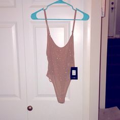 Brand New With Tags Size Medium See Through But Super Sexy Runs Small Retails $39 Sleeveless Summer Bodysuit For Night Out, Sleeveless Bodysuit For Night Out At The Beach, Sleeveless Bodysuit For Night Out Beach Season, Summer Stretch Leotard For Night Out, Backless Party Leotard With Lined Body, Summer Club Bodysuit With Lined Body, Summer Club Bodysuit, Trendy Lined Bodysuit For Night Out, Trendy Bodysuit With Lined Body For Night Out