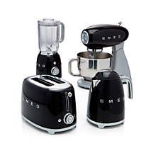 three different blenders are sitting next to each other on a white surface, one is black and the other is silver