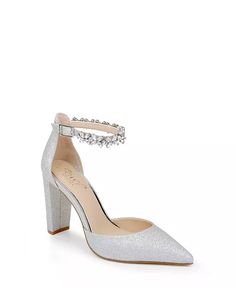 a pair of silver high heeled shoes with ankle strap and jewel embellishment