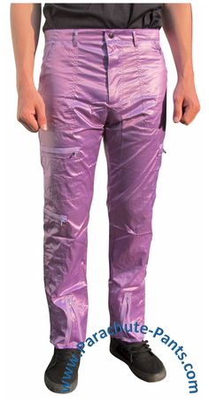 Awesome nylon Countdown Parachute Pants will bring you back to the 80s in no time. Break dancing is optional, and pockets are plentiful. You’ll be making a swooshing noise when you walk. These Countdown Parachute Pants have a tight fit and shiny finish that will really get you noticed. The pants come with two zippered pockets on the right leg and one zippered pocket on the left leg, along with two front zippered pants pockets and one zippered back pocket. There are also zippers at the bottom of Parachute Pants 80s, Purple Parachute Pants, Parachute Pants Outfit, Break Dancing, Back To The 80s, Back To The 80's, Zipper Pants, Break Dance, Body Heat