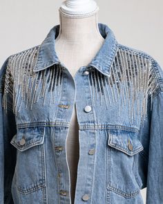 Rhinestone Jean Jacket. Available in sizes Small and Medium, Spring Long Sleeve Outerwear With Rhinestone Rivets, Long Sleeve Rhinestone Outerwear For Fall, Winter Long Sleeve Outerwear With Rhinestones, Denim Jacket With Rhinestones, Winter Rhinestone Long Sleeve Outerwear, Casual Long Sleeve Outerwear With Rhinestones, Trendy Embellished Long Sleeve Outerwear, Casual Long Sleeve Outerwear With Rhinestone Fringe, Fall Denim Jacket With Rhinestones