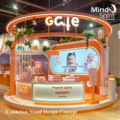 an exhibit stand with baby products on display in front of a large sign that says,'exhibition stand design concept '