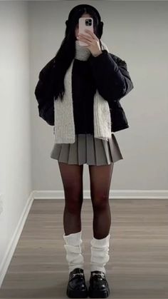 Skirt With Black Pantyhose Outfits, Big Sweater With Skirt Outfit, Puffer And Skirt Outfit, Miniskirt Winter Outfit, Winter Female Outfits, Plade Skirt Outfit Women, Winter Sweater And Skirt Outfit, Leg Warmer Skirt Outfits, Christmas Outfit With Skirt