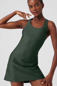 For tournament season and beyond, the Airlift Fly Dress is your secret weapon for a winning court-to-street look. This A-line tennis dress is made from our signature, super-sleek performance Airlift fabric with a racerback, built-in shelf bra and breathable, back cut out. For additional cover, wear it with your favorite Alo short underneath. Alo Yoga Summer Workout Activewear, Summer Workout Activewear By Alo Yoga, Alo Yoga Sporty Summer Activewear, Sporty Alo Yoga Activewear For Summer, Green Fitted Sleeveless Tennis Dress, Fitted Green Sleeveless Tennis Dress, Sporty Scoop Neck Workout Dress, Sporty Fitted Dress With Scoop Neck, Sporty Fitted Scoop Neck Dress