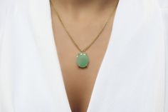 "A large pendant necklace made with an Aventurine pendant. This amazing crystal necklace is everything beautiful and breathtaking. Lovely green necklace to appease your gemstone jewelry collector heart. ♥ Gemstone Type - Green Aventurine ♥ Gemstone Size - 16x20mm ♥ Gemstone Cut - Oval ♥ Metal Type (Main Photo) - 14k Gold Filled - More options available in the drop down menu ♥ Length (Model Photo) - 45cm/18\" - Available from 14\" to 24\" (no additional cost) ❏ Why Buy This Unique Handmade Jewelr Oval Chrysoprase Necklaces With Natural Stones, Oval Chrysoprase Natural Stone Necklace, Oval Emerald Necklace With Natural Stones For Gift, Green Oval Necklace With Large Stone, Oval Green Necklace With Large Stone, Oval Chrysoprase Gemstone Necklaces, Oval Chrysoprase Gemstone Necklace, Chrysoprase Oval Pendant Necklace As Gift, Chrysoprase Necklace With Large Stone As Gift