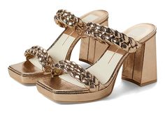 Dolce Vita Ashby - Women's Shoes : Dark Gold Crackled Stella : Don a statement look styling with the fashionable Dolce Vita sandals and grab the attention everywhere you go. Synthetic upper. Synthetic lining and comfortable footbed. Braided style detailing. Square toe. Chunky block heel. Synthetic outsole. Imported. Heel height: 3.5 in. Platform height: 0.63 in. Trendy Block Heel Sandals With Cushioned Footbed, Gold Block Heel Sandals In Synthetic Material, Gold Synthetic Block Heel Sandals, Gold Synthetic Sandals With Block Heel, Trendy Gold Sandals With Stacked Heel, Summer Party Mules With Cushioned Footbed, Chic Mules With Cushioned Footbed And Block Heel, Chic Mules With Textured Footbed And Round Toe, Chic Round Toe Mules With Textured Footbed