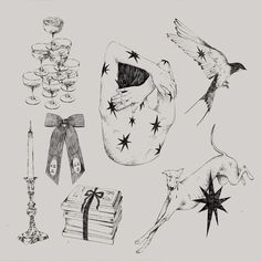 an ink drawing of various items including candles, wine glasses and a cat with stars on it