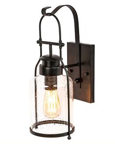 a light fixture with a glass shade on the front and back of it's arm