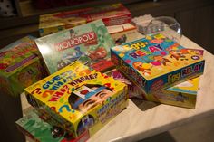 several children's board games on a table