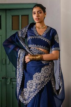 Blue saree with resham zari embroidered floral mandala and swirl patterns highlighted by sequin work. Comes with embroidered unstitched blouse piece. - Aza Fashions Fitted Blue Pre-draped Saree With Intricate Embroidery, Blue Embroidered Pre-draped Saree For Transitional Season, Fitted Pre-draped Tussar Silk Saree With Dupatta, Fitted Pre-draped Saree With Intricate Embroidery For Festivals, Traditional Fitted Pre-draped Saree For Navratri, Blue Fitted Pre-draped Saree With Cutdana, Fitted Pre-draped Saree With Dupatta For Transitional Season, Blue Traditional Pre-draped Saree With Intricate Embroidery, Fitted Anarkali Style Sharara In Tussar Silk