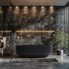 a large black bathtub sitting in the middle of a bathroom