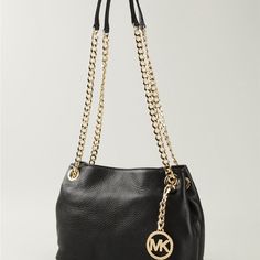 Michael Kors Jet Set Leather Shoulder Bag Satchel Handbag Tote Purse Michael Kors Bag Brand: Michael Kors Style: Jet Set Black Leather Chain Shoulder Tote Bag Material: Leather Measurements: Height: 7″ Width: 10″ Depth: 3″ Everyday Gold Bags With Metal Logo, Gold Bags With Metal Logo For Everyday Use, Everyday Gold Bag With Metal Logo, Chic Black Shoulder Bag With Metal Logo, Black Bags With Metal Logo For Everyday Use, Classic Black Bag With Gold Chain, Everyday Leather Bags With Gold Chain, Black Leather Bag With Gold Chain, Purse Michael Kors