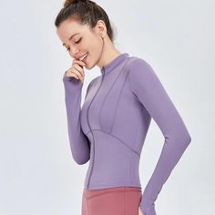 Solid Color Stretch Long Sleeve Outerwear, Solid Stretch Long Sleeve Outerwear, Versatile Nylon Long Sleeve Outerwear, Winter Nylon Tops For Gym, Long Sleeve Nylon Winter Top, Long Sleeve Nylon Top For Winter, Long Sleeve Nylon Tops For Fall, High Stretch Long Sleeve Outerwear For Layering, High Stretch Nylon Tops For Winter