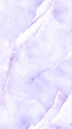 an abstract marble background with light purple hues and white streaks on the surface,