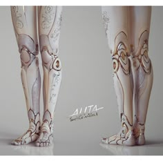 the legs and ankles of a woman in white with gold designs on them, are shown