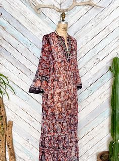 See more Deadstock from our shop here: https://www.etsy.com/shop/riseintothesun Awesome vintage hippie 70's DEADSTOCK (never worn) semi sheer cotton Batik print maxi dress with hand embroidered detail. 100% cotton. Hangs straight. Made in India. Hand wash line dry. Excellent condition as it is still new but there may be minor and natural imperfections in the fabric/printing, etc. Please have a look at the measurements (not just size) to ensure proper fit. fits like a medium armpit to armpit: 21" length: 57" Please Note - Measurements are taken while laying flat - Some items may have been pinned for a more fitted look  - Please check all measurements before making a purchase - Any added accessories are not included unless otherwise stated in the listing About our Deadstock Collection: - Nev Bohemian V-neck Maxi Dress With Batik Print, Bohemian Paisley Print Festival Dress, Bohemian Festival Dress With Paisley Print, Long Bohemian Batik Print Dress, Hippie Style Paisley Print Festival Dress, Hippie Paisley Print Festival Dresses, Hippie Festival Dress With Paisley Print, Hippie Batik Print Dresses For Festival, Bohemian Flowy Batik Print Maxi Dress