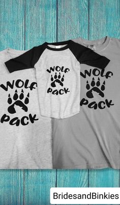 Wolf Pack T-shirts perfect for the entire family! OUR BESTSELLER 🖤 ((CAN BE COMPLETELY CUSTOMIZED PLEASE MESSAGE US)) Quality & Sizing: We only use the best and most durable vinyl, Thermoflex vinyl. Soft and comfortable fabric. Women's - {Bella+Canvas} Short-Sleeved AND {Gildan} Long-sleeved. Crew Neck. Men's - {Gildan} Short-Sleeved AND Long-sleeved. Crew Neck. Kids Youth - {Gildan} Short-Sleeved AND Long-sleeved. Crew Neck. Kids Toddler- {Rabbit Skins} PLEASE NOTE sizes 2T,3T AND 4T {Grace Cr Custom Print Short Sleeve T-shirt For Family Outings, Cotton Graphic T-shirt For Family Outings, Family Matching Black Shirt With Funny Print, Gray Family Matching Short Sleeve Tops, Family Matching Gray Short Sleeve Tops, Family Matching Graphic T-shirt For Family Outings, Graphic Print Crew Neck T-shirt For Family Outings, Family Matching Gray Short Sleeve T-shirt, Gray Family Matching Short Sleeve T-shirt