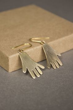 Surrealism-inspired small hand earrings made of brass with 14k gold-filled ear wires. Each pair is handmade in Brooklyn, NY. Brass Jewelry Handmade, Hand Earrings, Brass Jewellery, Keum Boo, Hammered Jewelry, Rough Jewelry, Kay Jewelry, Coin Pendant Necklace, Fine Silver Jewelry