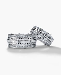 two white gold wedding bands with diamonds