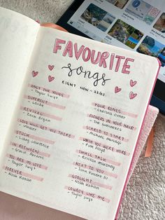 an open notebook with the words favorite songs written in pink and black ink on it