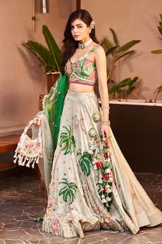 Mint green lehenga with sequins, crystals, mirror, cutdana and tassels embroidered flora and fauna motifs. Paired with coordinating lace embroidered blouse and tasselled dupatta. - Aza Fashions Semi-stitched Floral Embroidered Lehenga For Wedding, Semi-stitched Lehenga With Floral Embroidery, Semi-stitched Lehenga With Intricate Multicolor Embroidery, Floral Embroidered Semi-stitched Lehenga, Multicolor Embroidered Lehenga With Cutdana, Mint Green Lehenga, Genelia D'souza, Kurta Lehenga, Sanya Malhotra