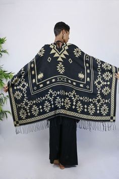 This gorgeous shawl is an easy throw and go addition. It’s tribal elements are woven into the garment. Great way to add a cozy, yet stylish finish to any outfit. Choose the black side or tan side…either way you are sure to look culturally chic. Belt not included. One Size Fits All Black Bohemian Handwoven Poncho, Bohemian Black Handwoven Poncho, Bohemian Shawl With Woven Motifs For Winter, Black Bohemian Shawl For Fall, Winter Bohemian Shawl With Woven Motifs, Black Bohemian Wraps One Size, Bohemian Black Wrap One Size, One Size Black Bohemian Wrap, Black One Size Bohemian Wrap