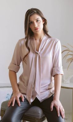 Vinci Silk Bow Blouse Luxury Classic Blouse With Concealed Placket, Luxury Silk Tie Neck Blouse, Luxury Silk Blouse With Bow, Luxury Silk Blouse With Bow Detail, Luxury Satin Tie Neck Top, Luxury Satin Tie-neck Top, Luxury Silk Tops For Business, Luxury Women's Tie Neck Top, Luxury Blouse With Concealed Placket For Office