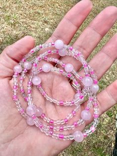 Gorgeous Metallic Clear and hot pink waist beads with Rose Quartz stone 8mm stone beads. These waist beads remind me of bubble gum and lots of love! They are perfect for self-love, increasing love for others (especially in your love life), and fertility.  Rose quartz - is known as a healing crystal and the stone of unconditional love. It's believed by some to emit strong vibrations of love, which are thought to: support emotional and relationship healing. inspire compassion. boost feelings of pe Pink Waist Beads With 108 Beads As A Gift, Spiritual Pink Hand-strung Beads, Spiritual Hand-strung Pink Beads, Pink Gemstone Beaded Necklaces, Pink 8mm Beaded Bracelets For Meditation, Pink Spiritual Beaded Necklace With Gemstone Beads, Spiritual Pink Rose Quartz Beaded Necklace, Pink Rose Quartz Spiritual Beaded Necklace, Adjustable Pink Beaded Necklace With 108 Beads