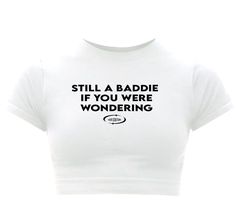 Still A Baddie Baby Tee Band Merch Crew Neck Crop Top With Letter Print, Band Merch Cropped T-shirt With Letter Print, Slogan Crew Neck Crop Top For Streetwear, Fitted Crew Neck Crop Top Band Merch, Casual Cropped Crew Neck T-shirt With Funny Text, Trendy Cropped Crew Neck Shirt With Letter Print, Funny Text Graphic Tee Crop Top With Short Sleeves, Band Merch Crew Neck Crop Top For Streetwear, Crew Neck Crop Top Band Merch For Streetwear