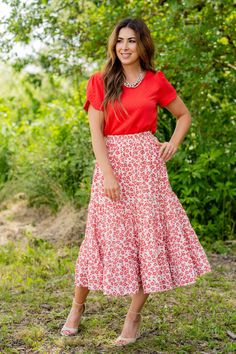 We cannot get over how stylish this skirt is! The beautiful floral print and tiered style fit makes such a cute, elegant look! Wear this skirt to any event and you are sure to receive compliments! We love tucking a blouse into this for a more elevated look or a basic or graphic tee for a casual feel! Self: 100% PolyesterLining: 100% Rayon Hand wash cold. Do not bleach. Lay flat to dry. Low iron if necessary. Casual Tiered Maxi Skirt For Garden Party, Casual Tiered Maxi Skirt With Floral Print, Relaxed Tiered Maxi Skirt For Garden Party, Flowy Tiered Skirt With Floral Print, Spring Tiered Dress With Relaxed Skirt, Tiered Maxi Skirt For Garden Party, Tiered Flowy Skirt For Day Out, Casual Tiered Dress With Lined Skirt, Tiered Skirt With Floral Print For Garden Party