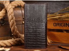 Boasting a combination of dependable genuine leather, heavenly cowskin, and endlessly durable cowhide, SkyJackerZ Men's Luxury Crocodile Wallet offers the ideal balance of premium quality and convenience. Intricately constructed with a non-zippered solid pattern, this wallet offers a relaxed esthetic suitable for any setting. Specifications: Material: Genuine Cow Leather, Aluminum Leather Type: Cow Hide Closer Type: Hasp, Non-Zippered Interior: Coin Pocket, Interior Compartment, Photo Holder, In Brown Crocodile Pattern Business Wallet, Brown Business Wallets With Crocodile Pattern, Formal Crocodile Pattern Leather Wallets, Formal Brown Wallet With Crocodile Pattern, Formal Leather Wallets With Crocodile Pattern, Rectangular Business Wallet With Crocodile Pattern, Business Wallet With Crocodile Pattern, Business Wallets With Crocodile Pattern, Daily Use Leather Wallet With Crocodile Pattern