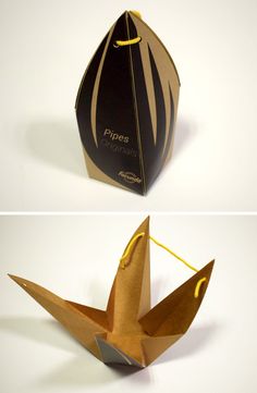 an origami bird is shown in two different views, one black and the other gold