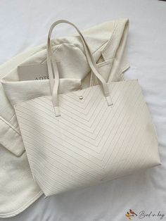 BirdinBag - Stylish V-Shaped Print Tote Bag with Elegant Pendant White Tote Hobo Bag For Office, White Hobo Tote Bag For Office, White Hobo Bag Tote For Office, White Pouch Bag For Office, Cream Pouch Bag For Office, Inch Bag, Tassels Decor, Details Pictures, Elegant Pendant