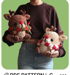 a woman holding two crocheted stuffed animals in her hands, both wearing reindeer hats