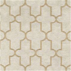 a beige and white rug with an intricate design