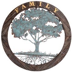 the family tree sign is made out of wood and has metal letters on it that read,