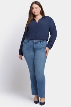 This classic fit can do no wrong. The easy, figure-elongating construction of NYDJ's Marilyn Straight Jeans in Plus Size pairs well with everything, thanks to a flattering waist and a versatile, knee-to-hem, straight-leg fit. Our Lift Tuck® Technology uses a proprietary slimming panel with a patented criss-cross design to shape and support your curves for an always-sleek silhouette. Features classic five-pocket styling and a zip fly with button closure. | NYDJ Women's Marilyn Straight Jeans In Plus Size in Heyburn, Size: 22W | Denim Plus Size Straight Leg Jeans, Plus Sized Straight Leg Jeans, Plus Sized Good American Jeans, Mid-rise Denim Pull-on Jeggings, Cross Designs, Ssbbw Jeans, Straight Jeans, Straight Leg Jeans, Sleek