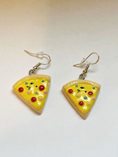 Pizza Earrings Slice of Pizza Earrings Fast food Novelty Earrings Cosplay Kitschy Food Motif Earrings Food Jewelry Chef American Eats Food - Fast food Novelty Earrings Cosplay Kitschy Food Motif Earrings Food Jewelry Chef American Eats Fastfood  Super Cute Food Earrings  Fish Hook Post   Dangle Drop Earrings  *Made with Silver Plated Hooks  Condition: Good Condition  Measurements:  Be sure to check out shop for more retro and vintage jewelry.  Add to your jewelry collection today!  ------------- Funny Earrings For Gift, Quirky Yellow Jewelry Gift, Quirky Yellow Jewelry For Gift, Pizza Earrings, Earrings Food, Slice Of Pizza, Novelty Earrings, Food Fast, Food Earrings