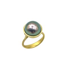 Tahitian Pearl Amazon Ring by Eve Streicker (Gold & Pearl Ring) | Artful Home Elegant Green Dome Ring, Elegant Green Gemstone Pearl Ring, Elegant Green Pearl Ring With Gemstone, Modern Iridescent Round Rings, Modern Iridescent Round Ring, Tahitian Pearl Jewelry With High Luster, Round Tahitian Pearl Jewelry With High Luster, Elegant Iridescent Cabochon Ring, Formal Iridescent Oval Ring