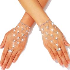 PRICES MAY VARY. Silver crystal gloves feature a unique ring and sparkling crystal, making your attire more charming and fashionable. Glitter gloves are suitable for most women. Their fabric fits very well, and the lace shows the curves of your hands, making you more attractive. Fashion hand chains with fashion style and rhinestones design, look very elegant and refined, make you more attractive in the eyes of others. Fingerless jewelry gloves can be used for masquerade parties, Halloween partie Crystal Gloves, Glitter Gloves, Rhinestone Gloves, Chain Crafts, Night Costume, Crystal Making, Hand Chain Jewelry, Mesh Gloves, Prom Accessories