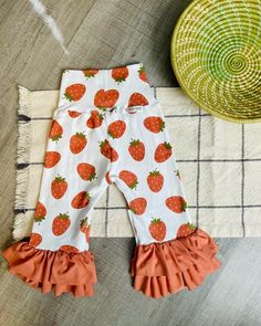 Super cute Strawberry pants, double ruffles of the softest knit fabric.  Perfect for strawberry season, birthday parties or just to wear any day and look adorable! Strawberry Fields, Cute Strawberry, Flare Pants, Soft Knits, Ruffles, Capri, Super Cute, Favorite Outfit, Girl Outfits