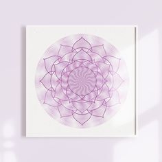 a purple and white art piece hanging on a wall