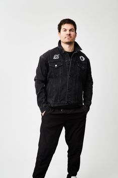 This black denim jacket keeps it subtle with tonal raised embroidery throughout and a dual chest print. Custom to the stitch, classic denim jacket styling with a relaxed fit, and Team Liquid branded shank buttons. On the inside, a white "paint" style Ninetails print adds a hidden touch for fandom. Details 100% Cotton, Premium Black Denim Leaf Village and Team Liquid swirl logo dual chest prints "Uzumaki Naruto" tonal raised embroidery down the sleeve Kunai tonal raised embroidery on back White " Urban Black Denim Jacket For Spring, Black Cotton Denim Jacket For Spring, Casual Black Denim Jacket For Spring, Black Denim Jacket For Streetwear In Spring, Black Denim Jacket For Spring Streetwear, Urban Black Cotton Denim Jacket, Black Cotton Urban Denim Jacket, Black Urban Denim Jacket For Streetwear, Washed Black Cotton Denim Jacket For Streetwear