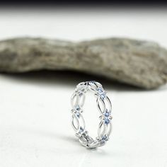 a ring sitting on top of a rock