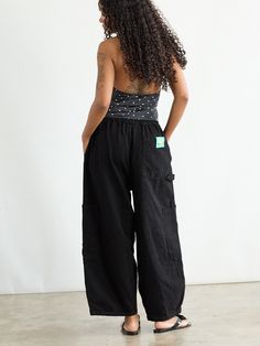 Looking cool and comfortable is now effortless! These oversized Chef Pants from Meals Clothing got you covered. 👨‍🍳 Designed for comfort and practicality with an extra-wide leg, elastic drawstring waistband and plenty of pockets 🤩 Unisex sizing for a fit that everyone can love ❤ Details 100% CottonMachine wash cold, Tu Black Cotton Parachute Pants With Drawstring, Athleisure Wide-leg Parachute Pants With Pockets, Utility Wide Leg Bottoms With Relaxed Fit, Relaxed Fit Parachute Pants With Pockets For Loungewear, Black Cotton Cargo Style Wide Leg Pants, Black Cotton Wide Leg Cargo Pants, Utility Harem Pants With Cargo Pockets, Utility Style Cotton Wide Leg Pants With Elastic Waistband, Utility Parachute Pants For Loungewear